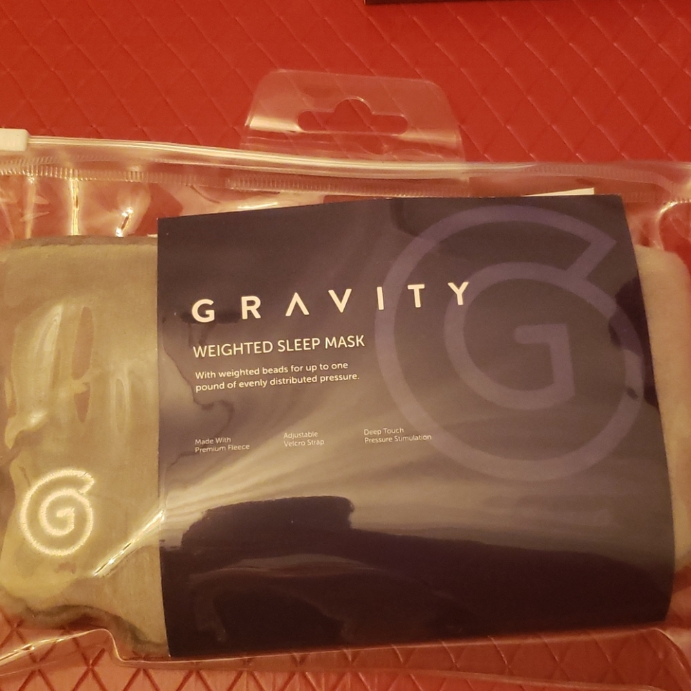 Gravity weighted sleep mask